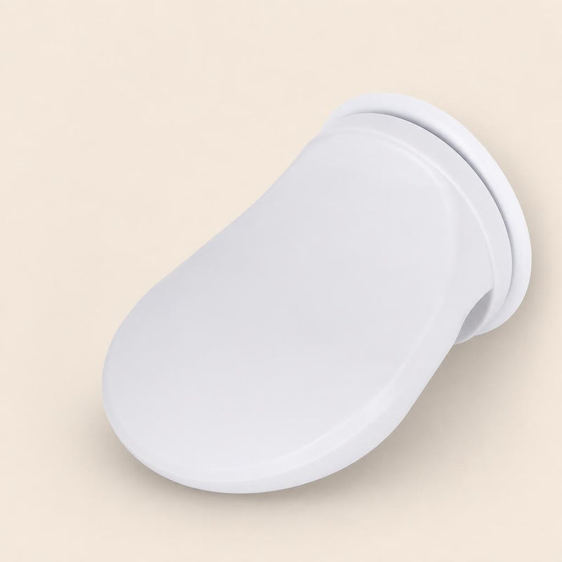 White shower foot rest with suction cup